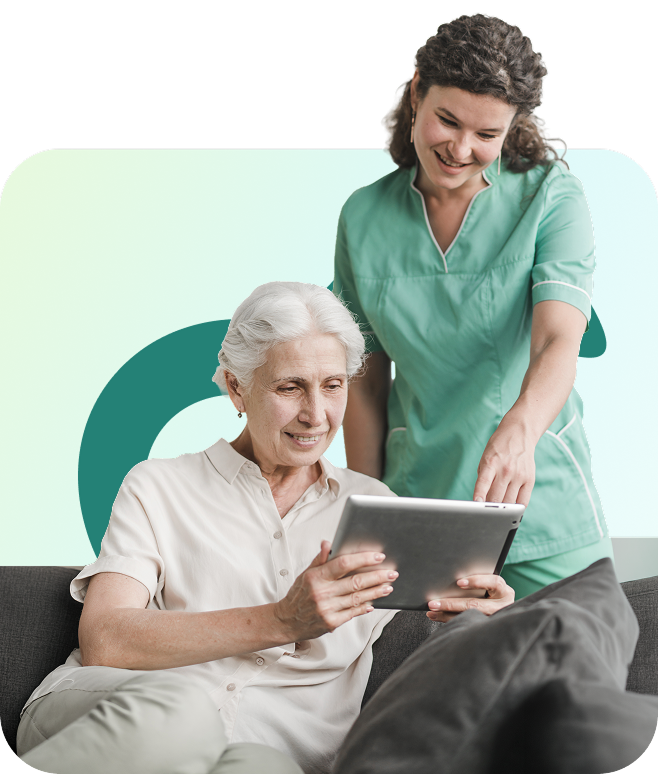 Caregiver and senior looking at tablet